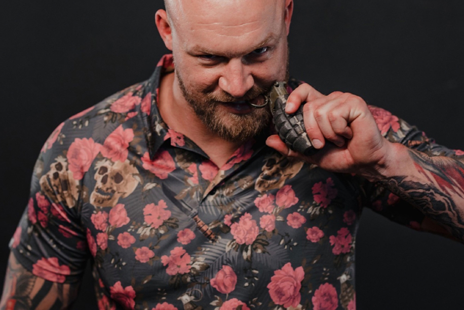 Man in custom skull and flower polo