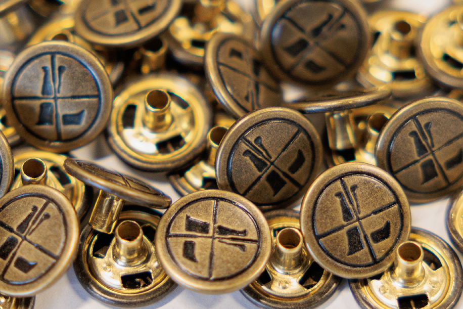 Custom Leupold logo buttons