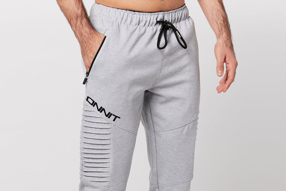 Man in grey ONNIT joggers