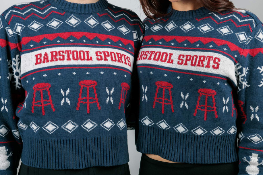 2 people in Barstool sports custom holiday sweaters