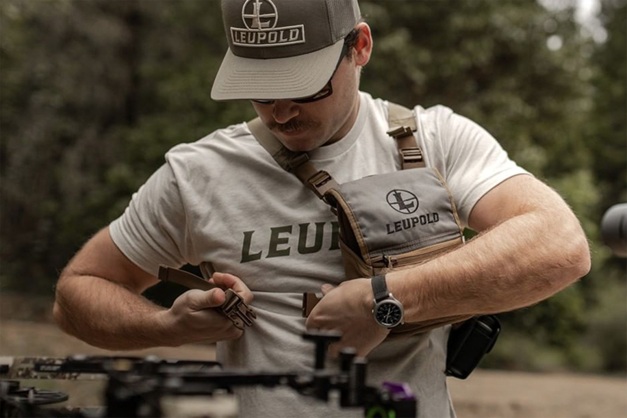 Man in leupold hat and shirt